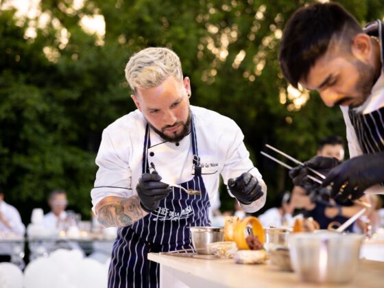 Chef Ariel Marciano putting on the finishing touches on a couple dishes for a mega wedding catering client. (Photo: Courtesy) Toronto best caterer of the year celebrity chef selling sunset