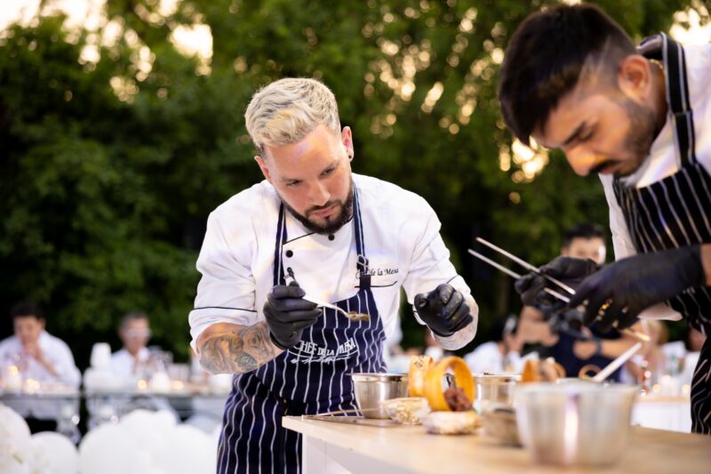 Chef Ariel Marciano putting on the finishing touches on a couple dishes for a mega wedding catering client. (Photo: Courtesy) Toronto best caterer of the year celebrity chef selling sunset