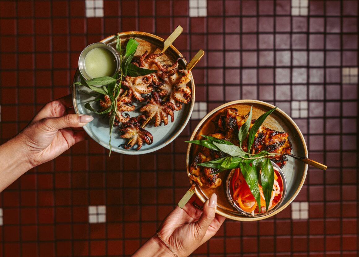 On the menu at Bourdain approve Vietnamese Street food spot in Toronto on Ossington Strip THỊT BA CHỈ NƯỚNG - BẠCH TUỘC NƯỚNG SATẾ SẢ ỚT, Pork and Octopus Skewers. (Photo: Sue-lee Wright)