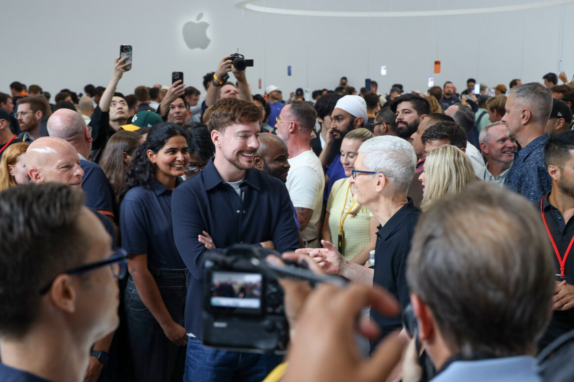 Tim Cook and MrBeast seen chatting at September release event 2025. (Photos: Steven Branco for View the VIBE / Gent's Post / Stamina Group)