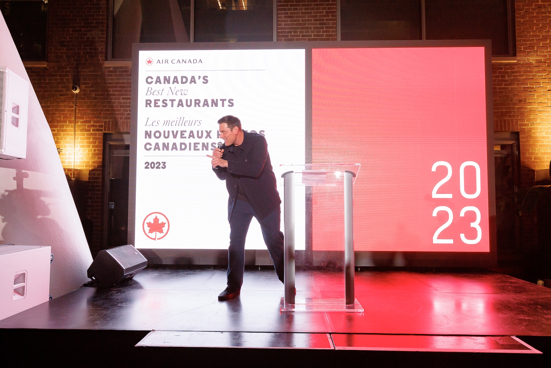 Chef Chuck Hughes on stage at the 2024 Air Canada's Best New Restaurant (ACBNR) event in Toronto. (Photo: Courtesy of Air Canada)