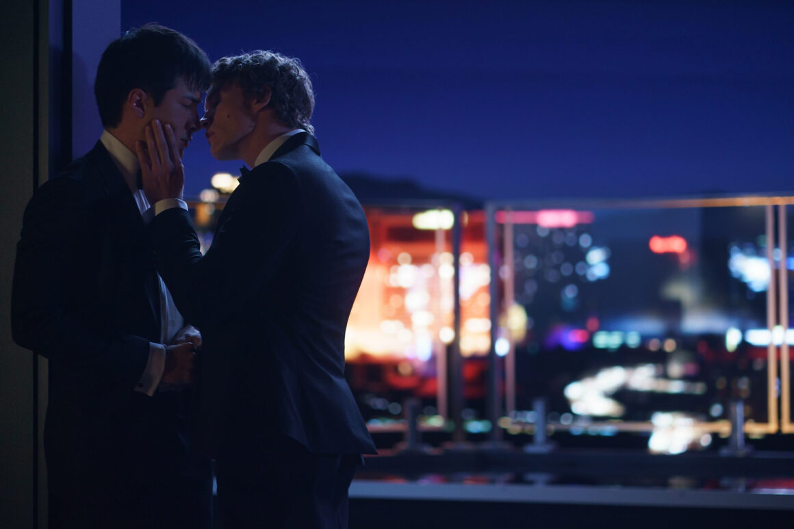 Heated Rivalry Olympics scene in Russia where Shane Hollander wears a Canadian sweater that went viral, inspiring fans to recreate the look. (Photo: Courtesy of Crave / Bell Media)