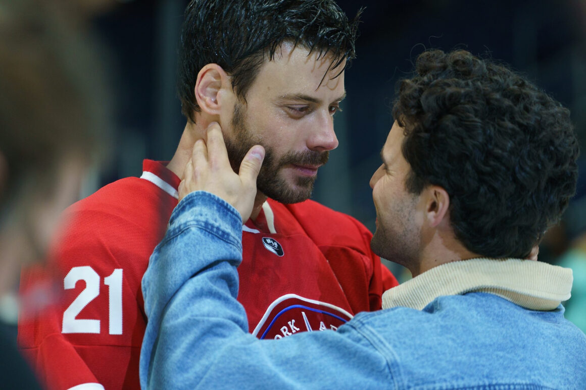 Heated Rivalry episode 5 scene where Kip publicly kisses Scott Hunter on the ice, coming out on national TV and sparking widespread fan reactions, one of the show’s most talked-about scenes.