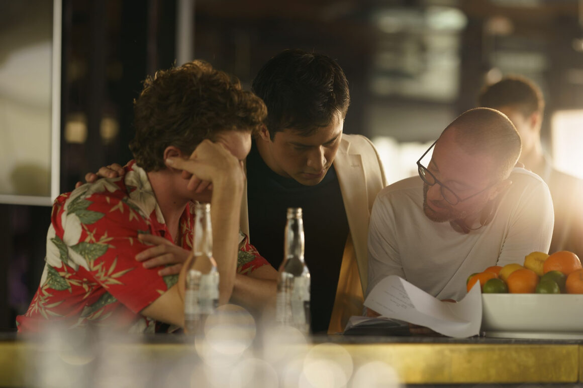 BTS shot of Jacob Tierney, the show runner extraordinaire (and many more titles at that) along side Shane and Ilya, at what we now know is the Lavelle rooftop lounge bar top. (Photo: Courtesy of Crave / Bell Media)