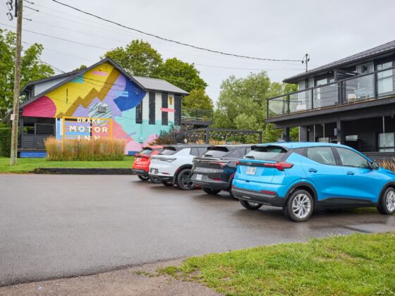 Chevrolet Equinox EV and Bolt EV on a road trip to Prince Edward County parked outside The Drake
